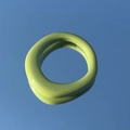 Macro-opname van een onregelmatige matcha groene harsring op een blauw reflecterend vlak - Matcha Groen
