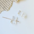 Close-up of transparent acrylic gummy bear charm with horizontal hole for DIY jewelry - 1 Piece/Pack / Clear White