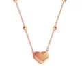 Elegante collar de corazón en titanio oro rosa con cadena de cuentas para un look chic - Rosa oro