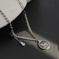 Modern silver rocking horse necklace with coin and dollar bag charms in multi-link design - Rocking Horse with Money (DM-1949) / Silver
