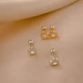 Detail of heart stud earrings with round zircon and spiral ball screw backs - Rhinestone Heart Spiral Stud / Gold