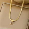 Gold snake chain necklace featuring a sparkling letter F pendant with micro-pave zircons - Letter F