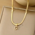 Gold snake chain necklace featuring a sparkling crystal-encrusted letter G pendant - Letter G