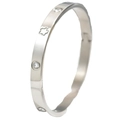 Gepolijste zilveren roestvrijstalen armband met bloemengravure en kristallen studs - Zilver