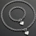 Parure bijoux en acier titane argenté avec pendentif cœur, fermoir à bascule et bracelet - Bracelet en Argent