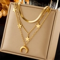 Three-layer gold titanium necklace with star and moon pendants on a jewelry box - Triple Layer Star Moon (N2053)