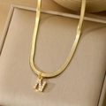 Gold snake chain necklace with sparkling crystal-encrusted letter N pendant - Letter N