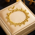 Elegant gold-tone stainless steel bead chain bracelet with adjustable extender on jewelry box - Golden Chunky Chain Bead Bracelet