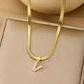 Gold snake chain necklace featuring a V-shaped pendant with crystal micro-pave setting - Letter V