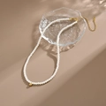 French vintage pearl necklace with a gold ball pendant on a decorative glass tray - Artificial Pearl Necklace (H381) / Gold