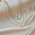 Four-layer gold titanium necklace with turquoise beads and sunburst round pendant - Round Medallion Turquoise (H1016) / Gold