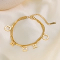 Elegante collar de titanio chapado en oro de doble capa con colgantes de trébol y estrella - Pulsera de Doble Capa de Flor Hueca (Dorado)