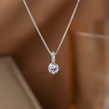 Silver bow cubic zirconia necklace with a brilliant round pendant on a box chain - Mini Single Rhinestone Necklace (9226) / Silver