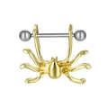Macro shot of gold spider-shaped body jewelry nipple ring with polished silver steel bar - Gold