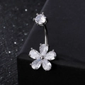 Detail of silver stainless steel navel ring featuring a pear-cut zircon sunflower design - 5-Petal Flower White