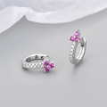 Detail of silver floral hoop earrings with magenta zircons and pavé-set crystals - Silver Base Red Zirconia