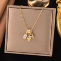 Gold pendant necklace with zircon stars and enamel ice cream charms in a jewelry box - Colorful Ice Cream (8303)