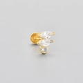 Macro detail of gold flat-back labret stud earring with marquise and round cubic zirconia - Marquise And Round Mix