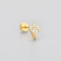 Macro shot of gold flat back earring with kite-shaped zircon and vintage beaded edge - Rhombus Shape