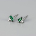 Detail of silver stud earrings with emerald green rectangle stone and zircon accent - Green Zirconia Silver