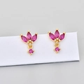 Macro detail of gold-plated marquise stud earrings with rose red crystals on display card - Gold/Rose Red