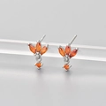 Detail of silver stud earrings with orange marquise gems and diamond-shaped pendant - Silver/Orange