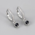 Macro shot of S925 silver hoop earrings with clear pavé stones and black round pendants - Black Rhinestone Round Hoop (Silver Tone)