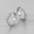 Macro shot of V-shaped silver earrings with S925 hallmark and sparkling cubic zirconia - V-Diamond Style / Large / White Gold