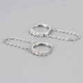 Detailed view of silver hoop earrings with white zircon accents and delicate drop chain - Chain Hoop Earring / Platinum/White