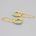 Detailed close-up of golden chain hoop earrings with inlaid turquoise stones - Chain Hoop Earring / Gold/Blue