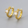 Close-up of S925 hallmark on gold plated earrings with square cut zircon stones - Gold/White Zirconia
