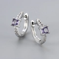 Detailed macro shot of S925 sterling silver hoop earrings with square purple zircon stones - Silver Tone/Purple Zirconia