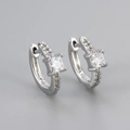 Macro shot of S925 sterling silver square zircon hoop earrings with polished finish - Platinum/White Zirconia
