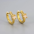 Detailed close-up of S925 hallmark on gold huggie earrings with champagne zircon - Gold / Champagne Zirconia