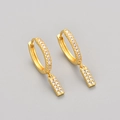 Detailed view of gold hoop earrings with micro-pave white zircon rectangular pendants - Gold / I