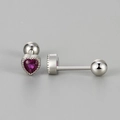 Detailed macro view of heart-shaped silver ear studs with purple zircon and screw back - White Gold / Rose Red