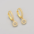 Elegant gold letter hoops with micro-set zircons on a gray minimalist background - Gold / O