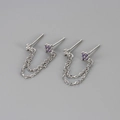 Detailed close-up of S925 sterling silver chain earrings with purple and clear zircon stones - Silver-Purple Zirconia