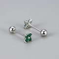 Detail of silver screw-back studs with four-leaf clover green zircon inlay - Four-Leaf Flower Screw Stud / Silver/Green Rhinestone