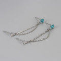 Macro detail of S925 sterling silver chain earrings with turquoise beads and zircons - Platinum-Turquoise Color