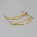 Detailed shot of double stud gold chain earrings with purple stones and clear white zircons - Gold-Purple
