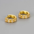 Detail of gold-plated hoop earrings featuring white opal stones with rainbow fire effect - Small / Gold Plated White