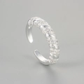 Macro shot of twisted silver ring band with pave set white cubic zirconia stones - Adjustable Open / Sparkling Rhinestone Ring / Silver
