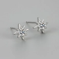 French vintage eight-pointed star stud earrings with sparkling center crystal - White Gold