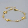 Französisches Vintage Armband in gebürstetem Gold mit Lilien-Motiv und Zirkon-Details - Gold