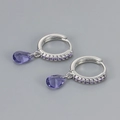 Detailed view of S925 silver hoop earrings with purple teardrop zircon and pave settings - White Gold Purple Zirconia