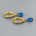 Detail of S925 stamped gold hoop earring with teardrop blue zircon and micro-pave setting - Gold Blue Zirconia
