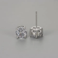 Macro detail of classic four-prong setting with brilliant round-cut cubic zirconia studs - White Gold / 7mm