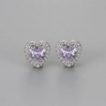 Elegant halo heart stud earrings featuring lavender zircon stones in a silver setting - Light Purple Zirconia