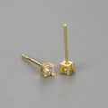 Macro detail of gold-plated four-prong round zircon stud earrings showing fine craftsmanship - Gold / 3mm